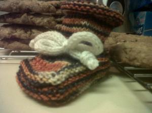 Finished bootie with the cookies I baked while knitting the ankle.