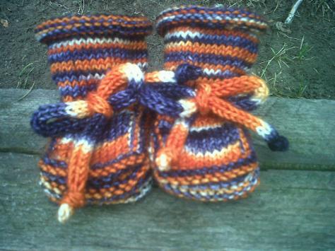 Baby booties made from the family pattern in Denver Bronco team colors.