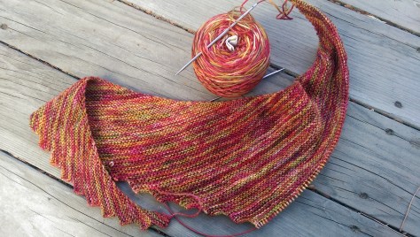 Half knitted Hitchhiker scarf.