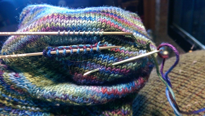 Joining new heel to bottom of the sock.