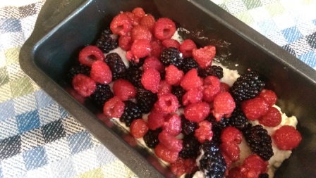 Berries on top of the batter.