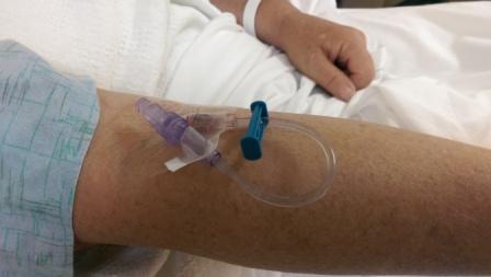 IV in arm.