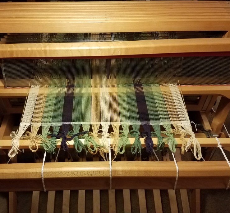 Warp on loom.