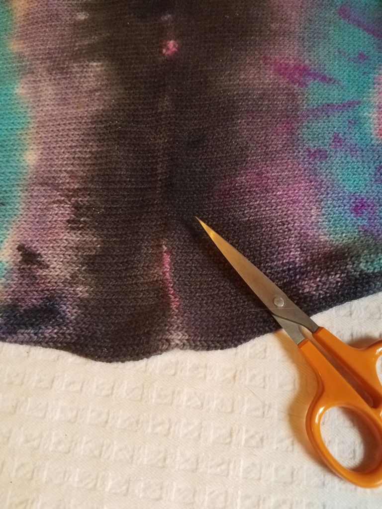 Cutting the sock blank.