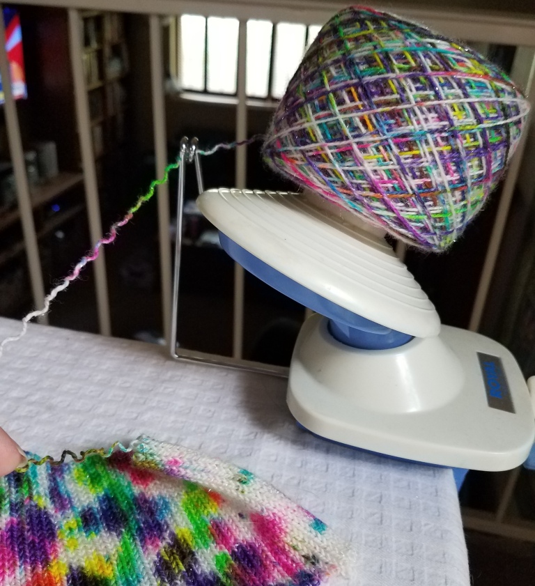 Winding a sock blank.