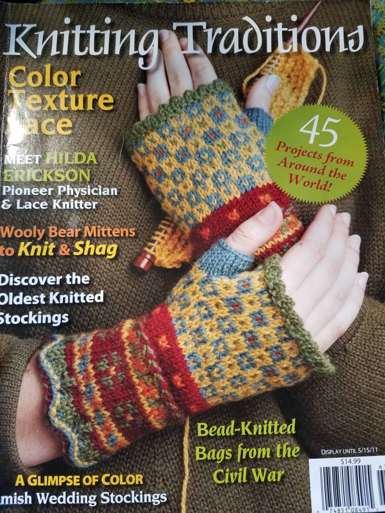 Mitts on magazine cover.