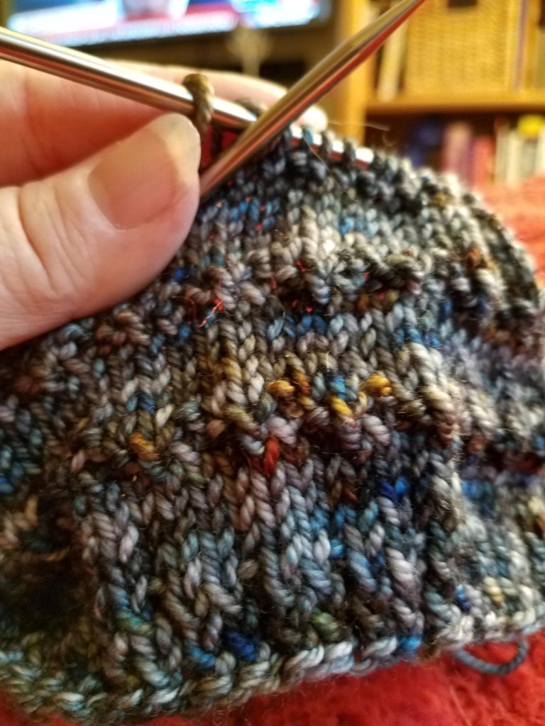 Stitch detail of the cowl.