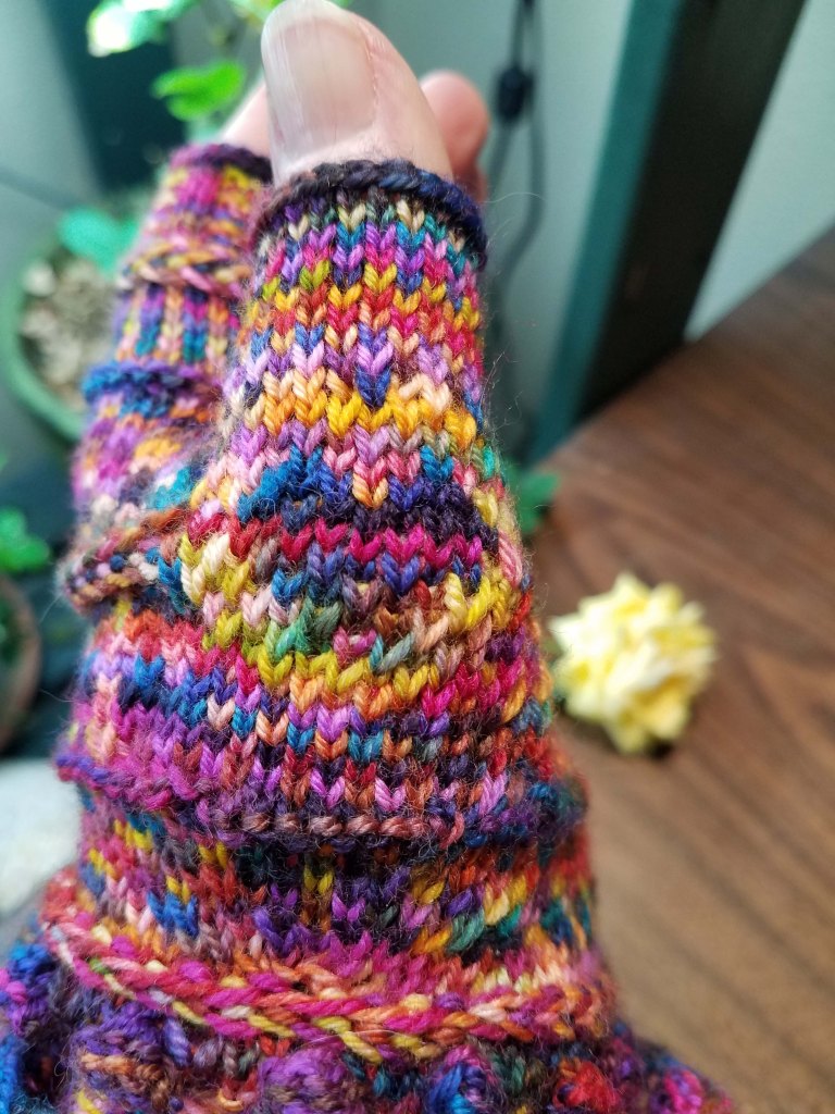 Heart detail on mitt thumb.